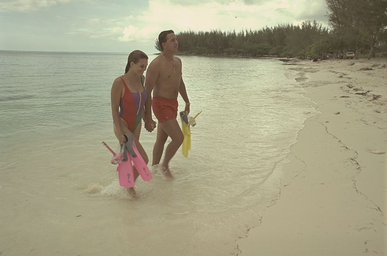 Couple walking along a beach